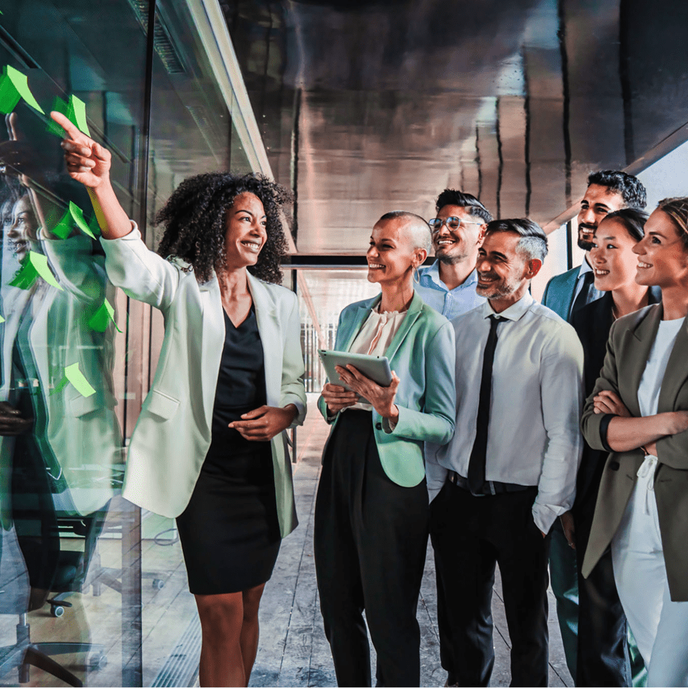 Business team collaborating with sticky notes.